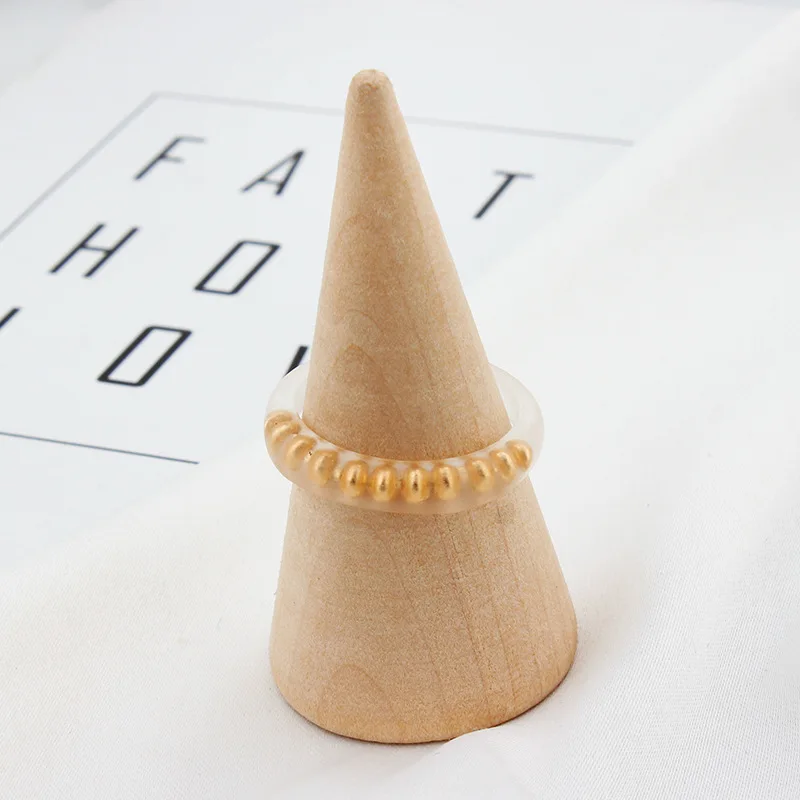

Ding yi Korean personality simple ring inlaid beads white resin geometric ring