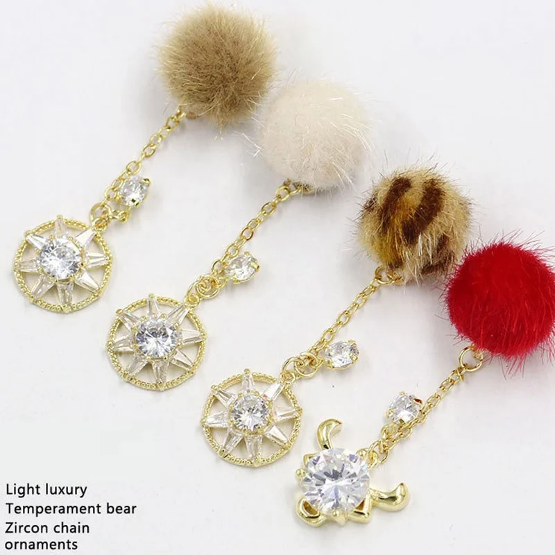 

Paso Sico 2022 Winter New Year Manicure Supplies Luxury Zircon Nail Charms with Round Pom Poms Pendant Chain Popular