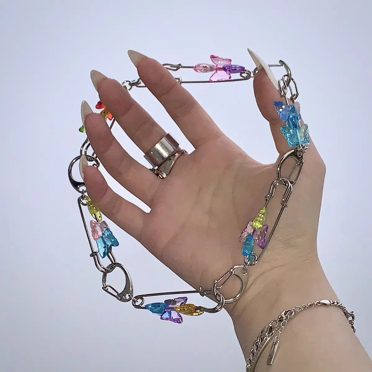 

Paper clip design, butterfly necklace