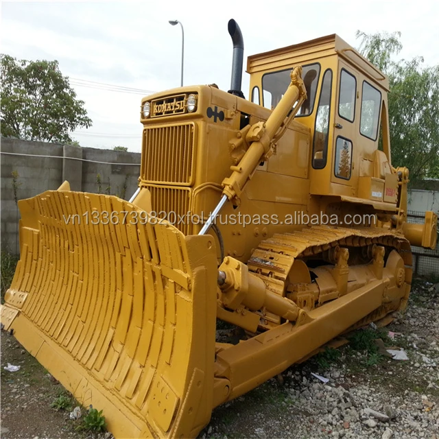 Бульдозер d155a. Японские Бульдозеры Komatsu. Бульдозер Япония. Бульдозеры Комацу 155 Ах в роботе. Каретка бульдозера 155 Комацу.