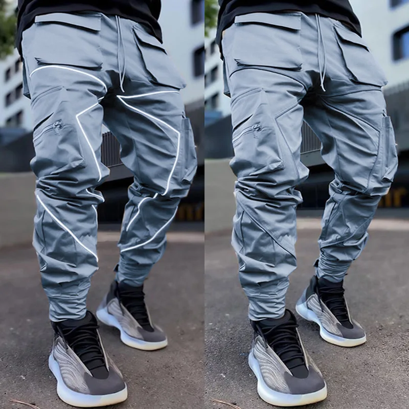 

Hot Sale Mens Reflective Pants Fashion Streetwear Loose Cargo Pants Plus Size Big Pockets Trousers Reflective Cargo Pants, Multicolored