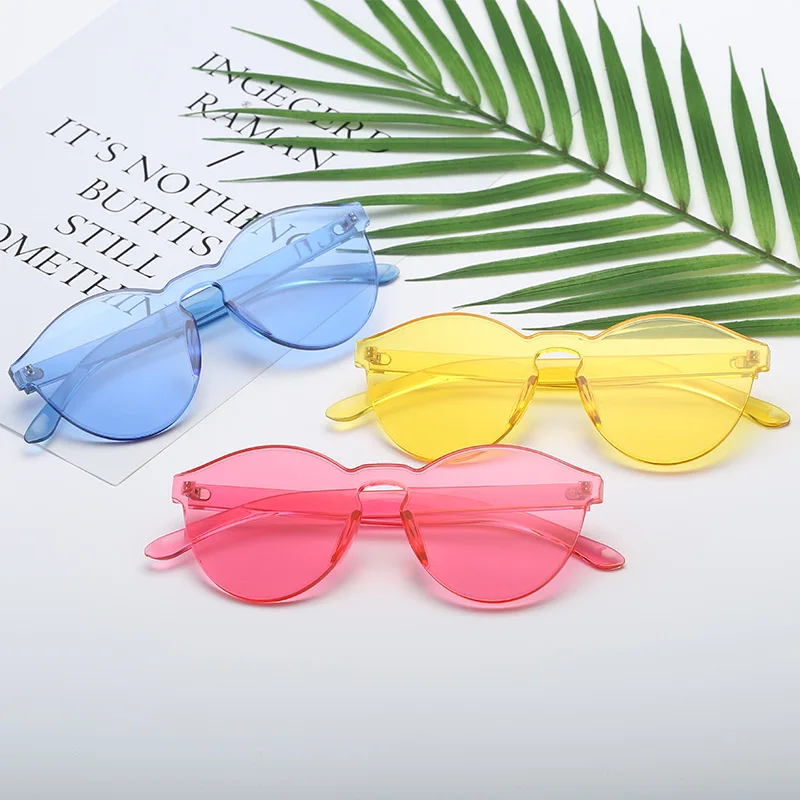 

NWOGLSS 002 Wholesale Colorful Classic Retro Rimless Women Sunglasses 2022