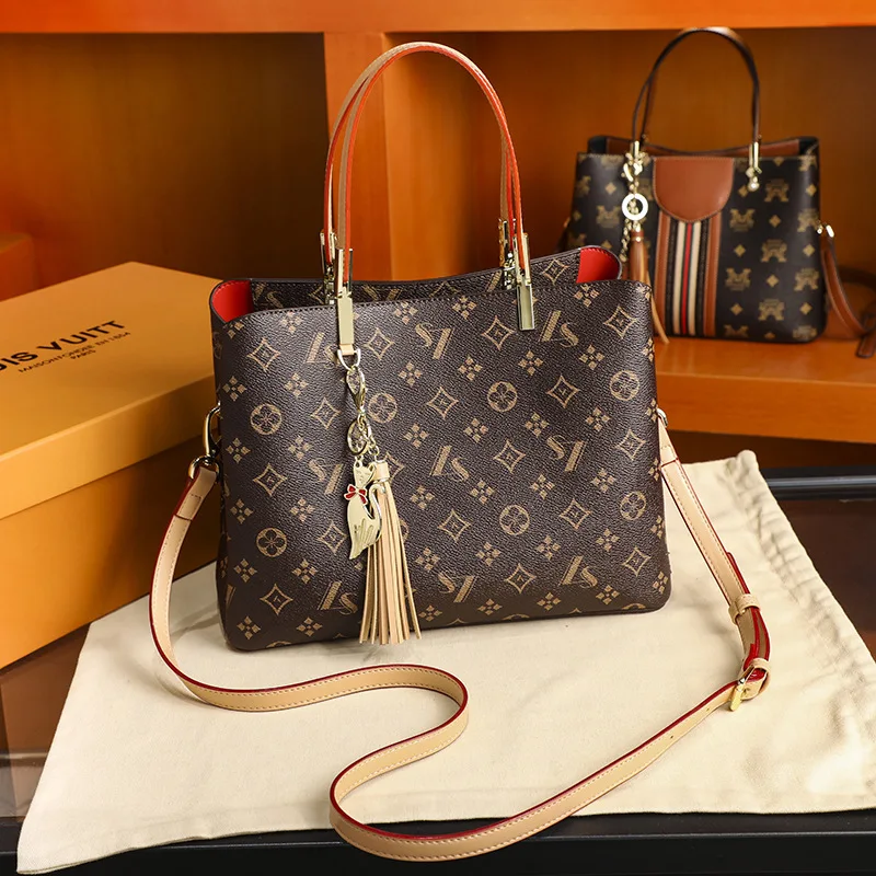

Genuine leather handbags new fashion messenger large-capacity bag bucket bag four-leaf clover