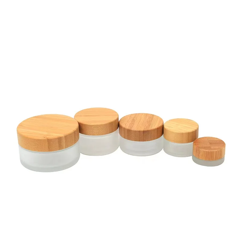 

Wholesale cosmetic luxury 30g 50g frosted glass cream jar with bamboo wood lid