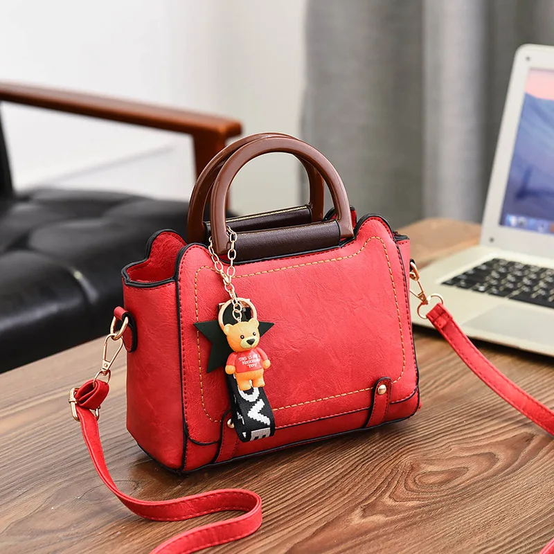 

TD1057 New product hot sale 2020 handbags for women for small short handle with tassel