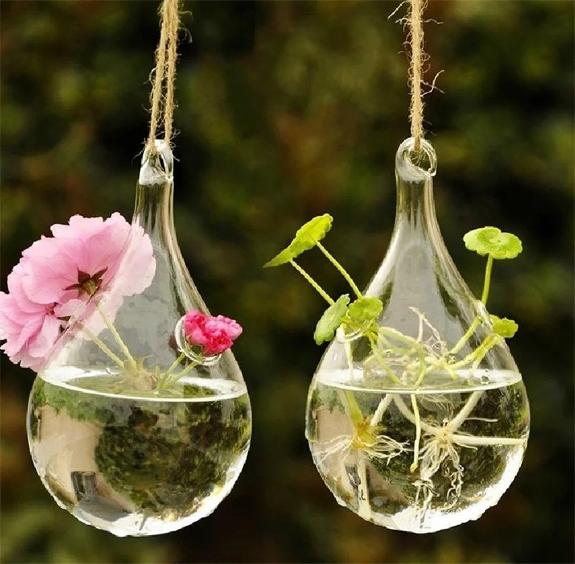 Из красивых ваз висевший воздухе. Подвесные стеклянные кашпо. Необычные вазы. Подвесные горшки стеклянные для цветов. Необычные стеклянные вазы.