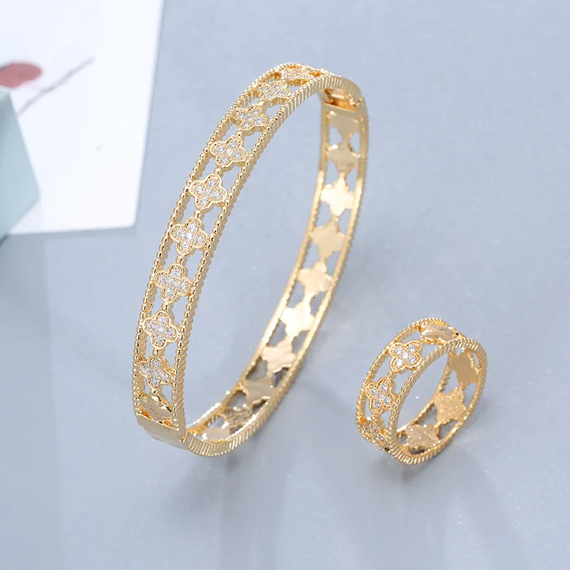 

Fashion hot sell popular copper inlaid Zircon Bracelet Ring Set four leaf flower hollow high quality women accessories