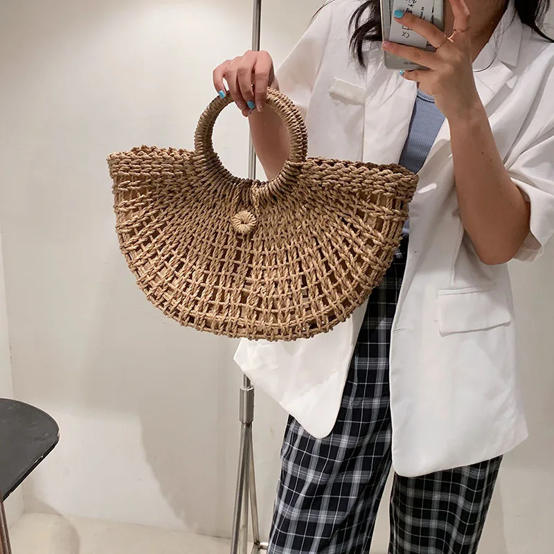 

Straw new fashion hollow female bag portable vacation beach woven retro leisure hand satchel bohemian bag