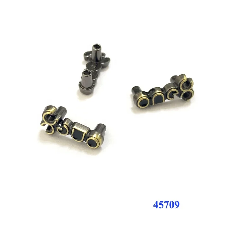 
Manufacturer designs shoe accessories metal brand name logo with legs 
