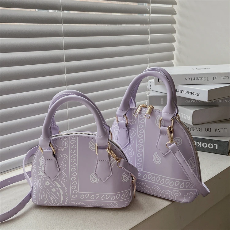 

2021 wholesale ladies cashew flower shell handbag