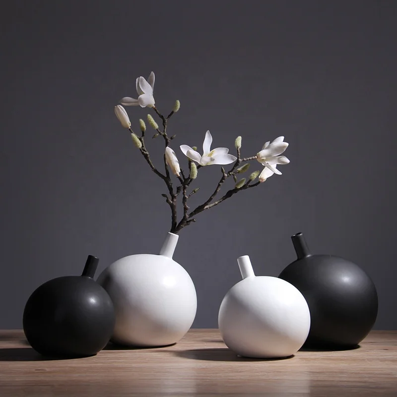 

Nordic style creative round oblique ceramic black and white vase