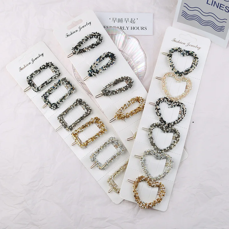 

Korean version of the new sweet pearl hairpin female love rhinestone word clip side clip girl frog buckle hairpin