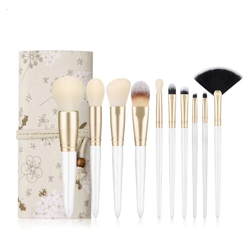 

Wholesale Professional Makeup Brush Set 10pcs Gold Ferrule Pearl White Makeup Brush Set With Gunny Bag Packaging