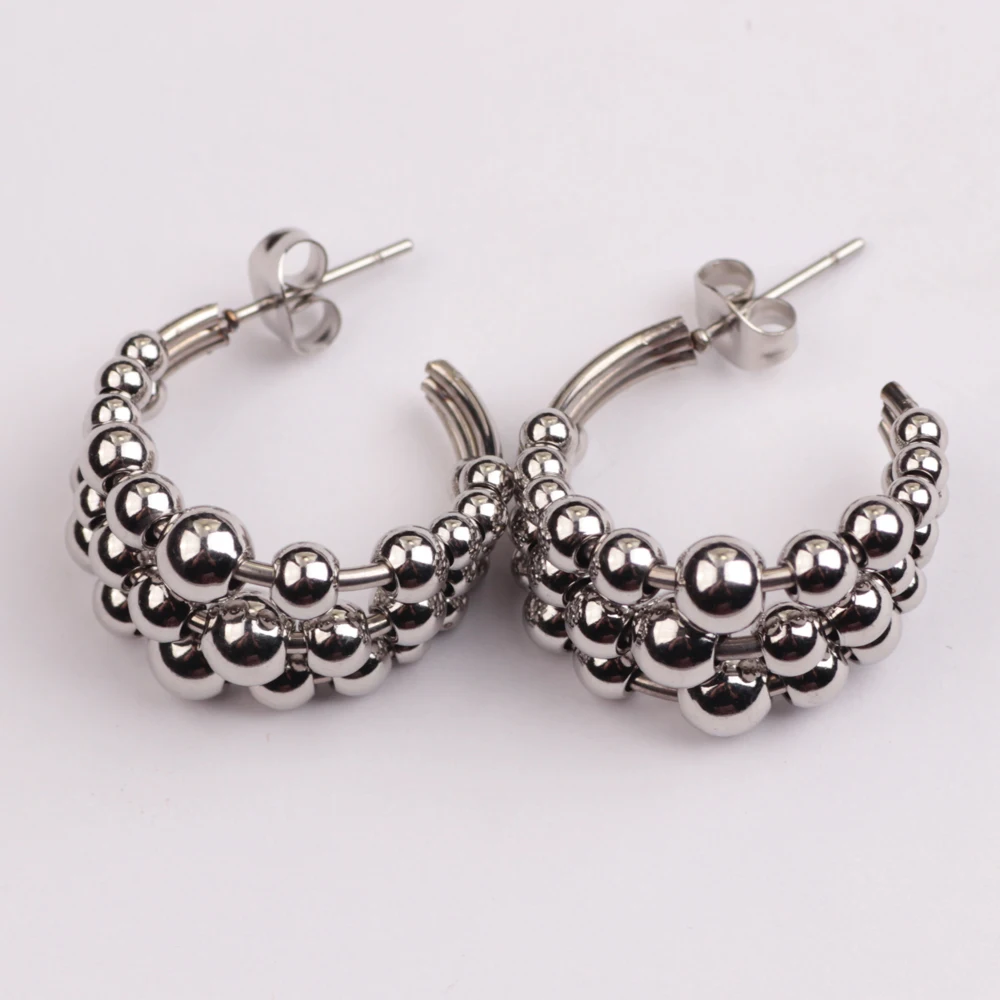 

Beautiful Ladies big twisted gold round hoop earrings with bead, Silver