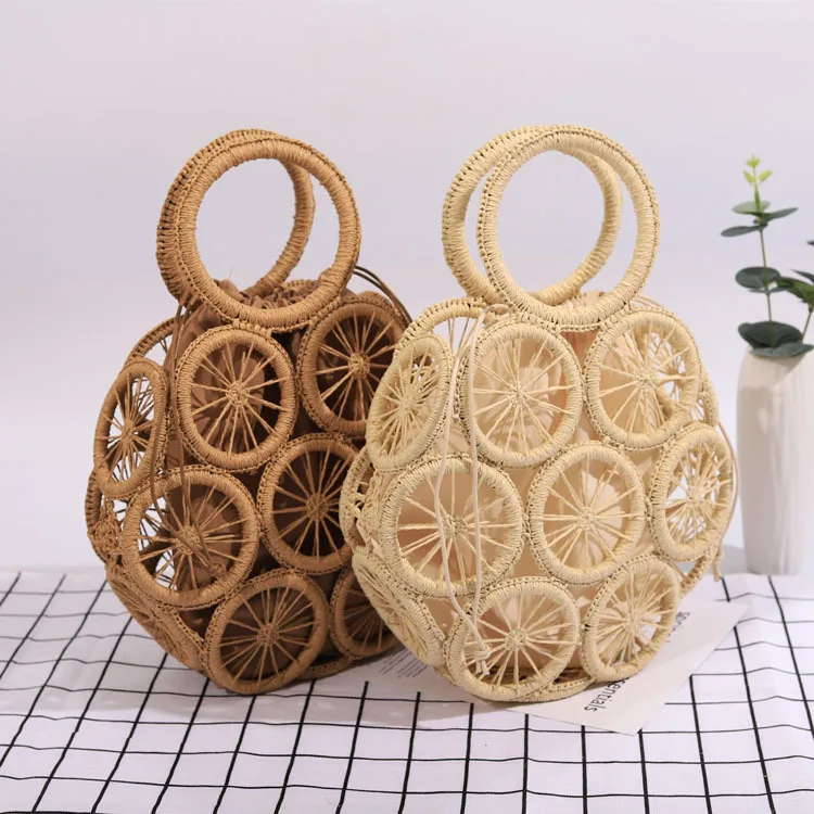 

Wholesale Handmade Straw Women Beach Handbag Woven Round Hollow Out Tote Bag