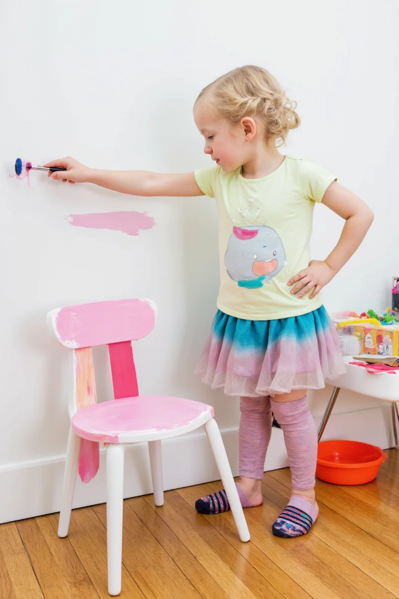 Closet door painted in coral pink