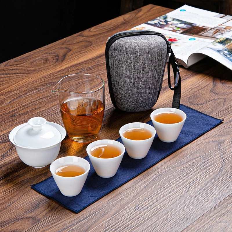 

Portable Chinese Kung Fu Travel Tea Set Ceramic Gaiwan Teacups Teapot with Travel Bag Tea for One, White or any pms colour is accepted