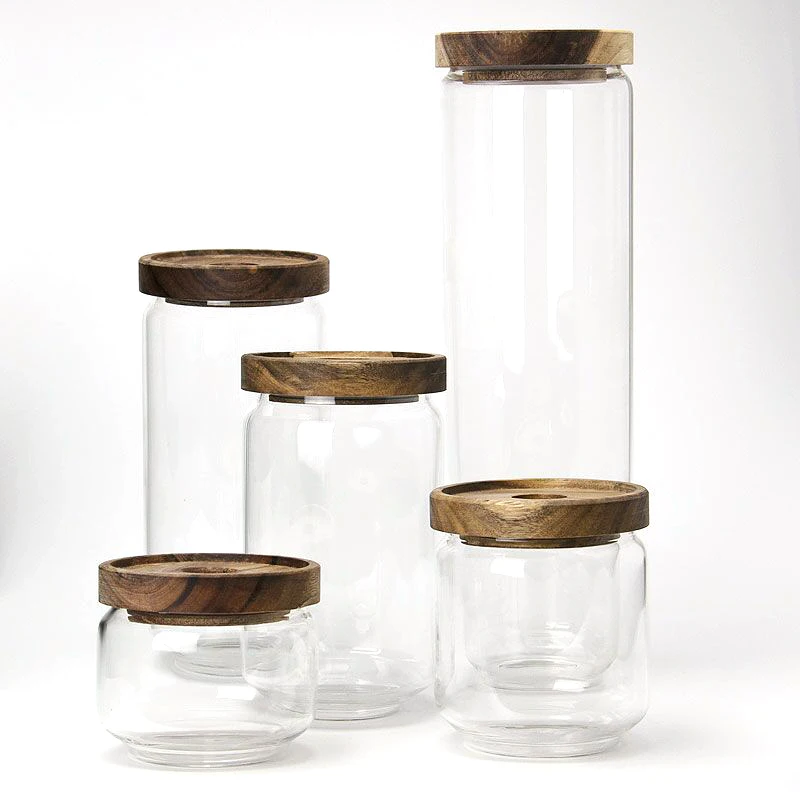 

Amazon Hot Sale Glass Sealed Jar With Transparent Covered Wood Lid Glass Storage Tank With Nut & Candy