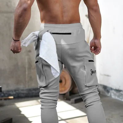 

Quick Dry Sports Fitness Youth Pants Custom Men Slim Fit Mens Sportswear Pants Draw Rope Pure Color Elastic Leisure