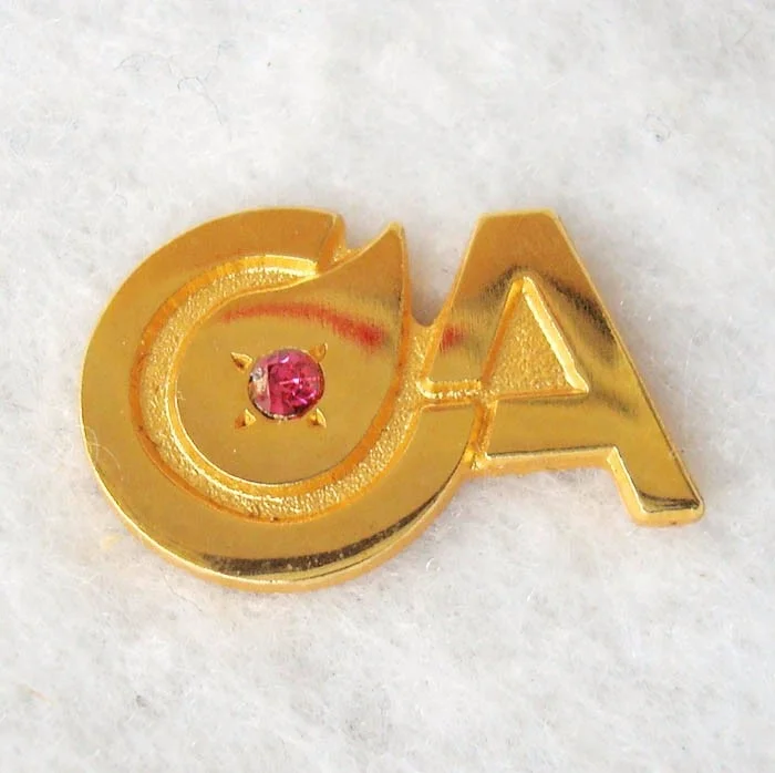 

Wholesale manufacturer Cheap Price Die Struck Rhinestone Gold Lapel Pins Badge, Patone color