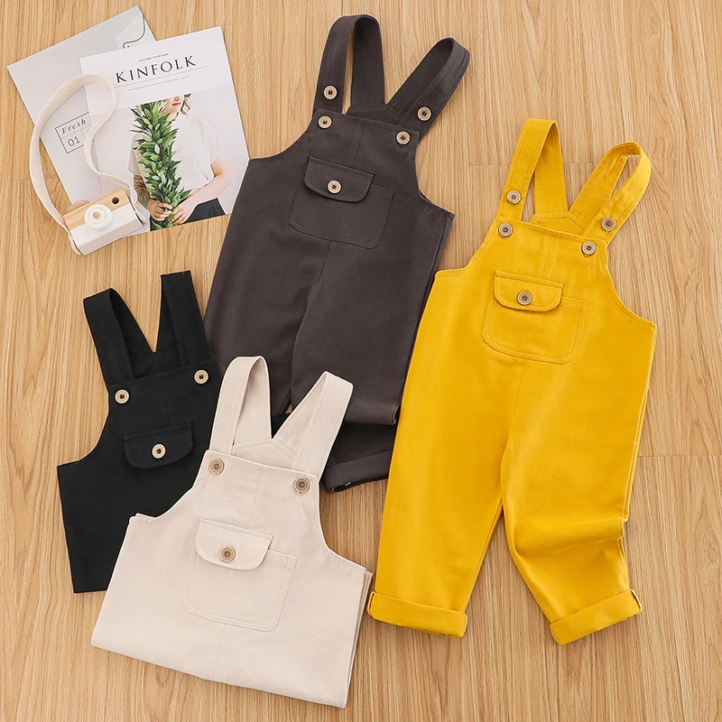 

2021 Latest Baby Boy Girl Sleeveless Button Romper Unisex Solid Color Jumpsuit Pocket Overalls One-Piece Summer Clothing
