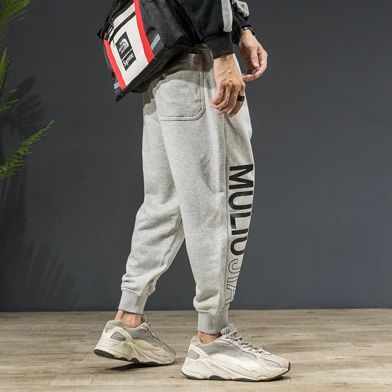 

Male loose fashion casual knitted printed elastic Drawstring Sweat pants Men Joggers Custom Running Pants, Shown