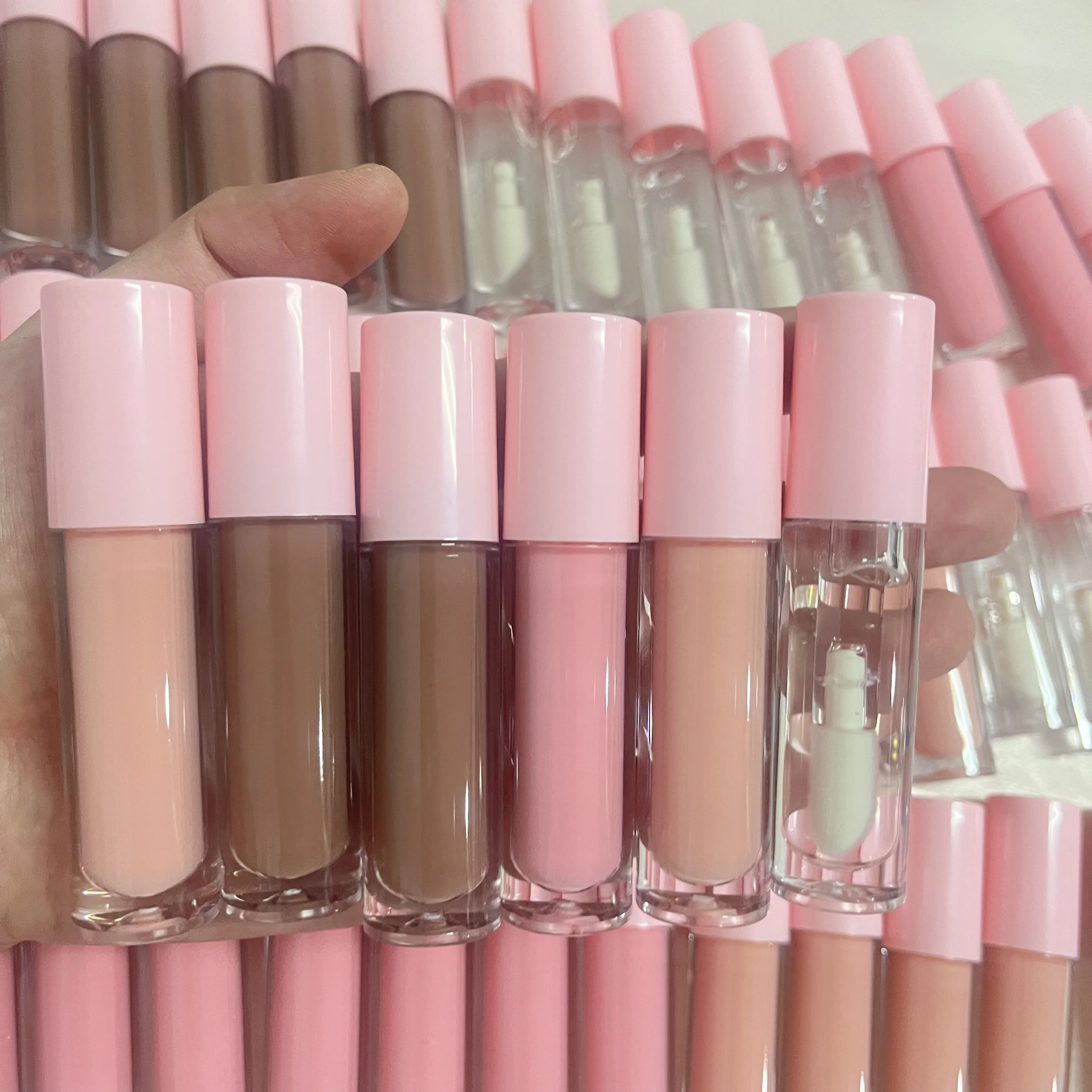 

Private label lip gloss custom tube packing pink nude clear plumping lip gloss vendor