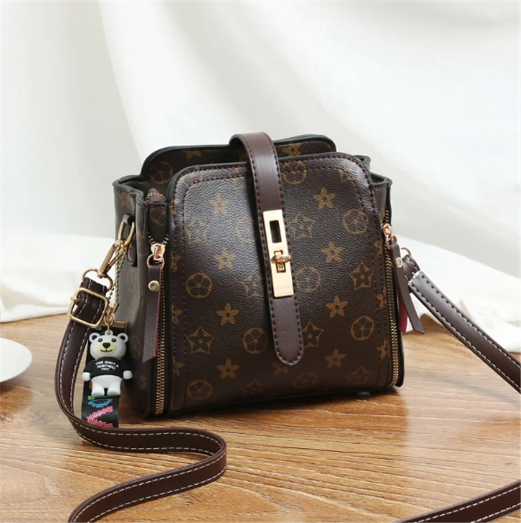 

The new Korean version of one shoulder bag cross - shoulder bag, fashionable women's bag, Red, green, black, brown, dark pink