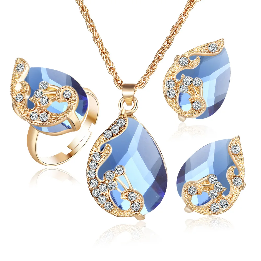 

2021 Classic Gold-Plated Austrian Crystal Water Drop Peacock Three Piece Set Pendant Necklace Earrings Ring Jewellery Set, As pic