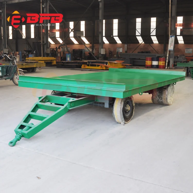 Flatbed tow rail flat trailer dolly for material handling