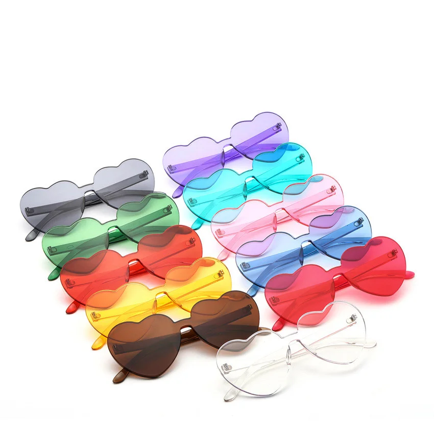 

2022 Wholesale Custom Frameless Lens Eyewear Cute Candy Color PC Rimless Sun Glasses one piece Love Heart Shape Sunglasses