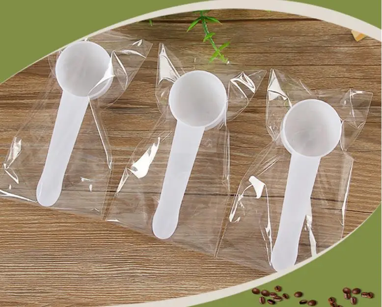 

Plastic milk powder measuring spoon with white color can measure liquid and can measure 10 grams of weight