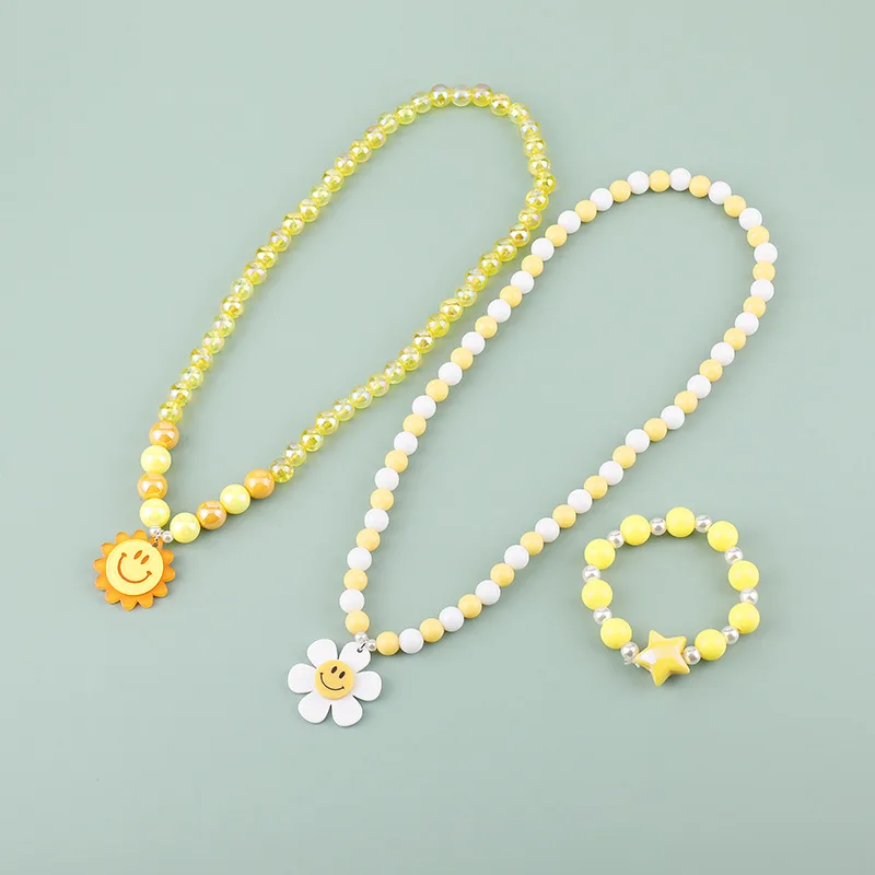 

Professional beauty children jewelry cartoon acrylic plastic sunflower daisy pendant beaded kids jewelry set, Customized color