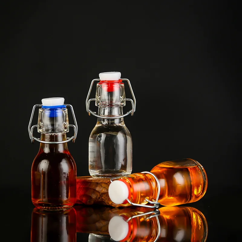 
Wholesale buckle bottle mini glass empty bottle 60ml thick small size wine bottle with lid 