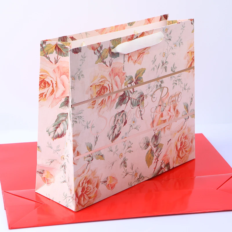 

China Manufacturer Luxury Rose Flower Printed Gift Custom Shopping Paper Bag With Foiled Stamping Logo