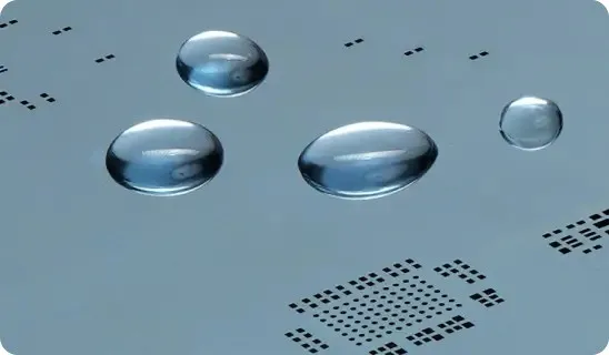 Nano-coated stencil with water droplets