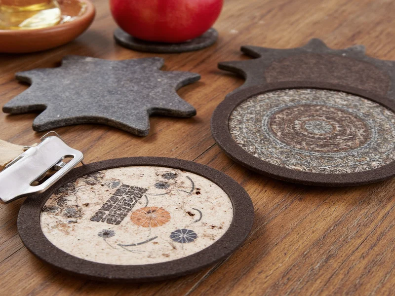 Finished grind craft projects including coasters and bottle openers