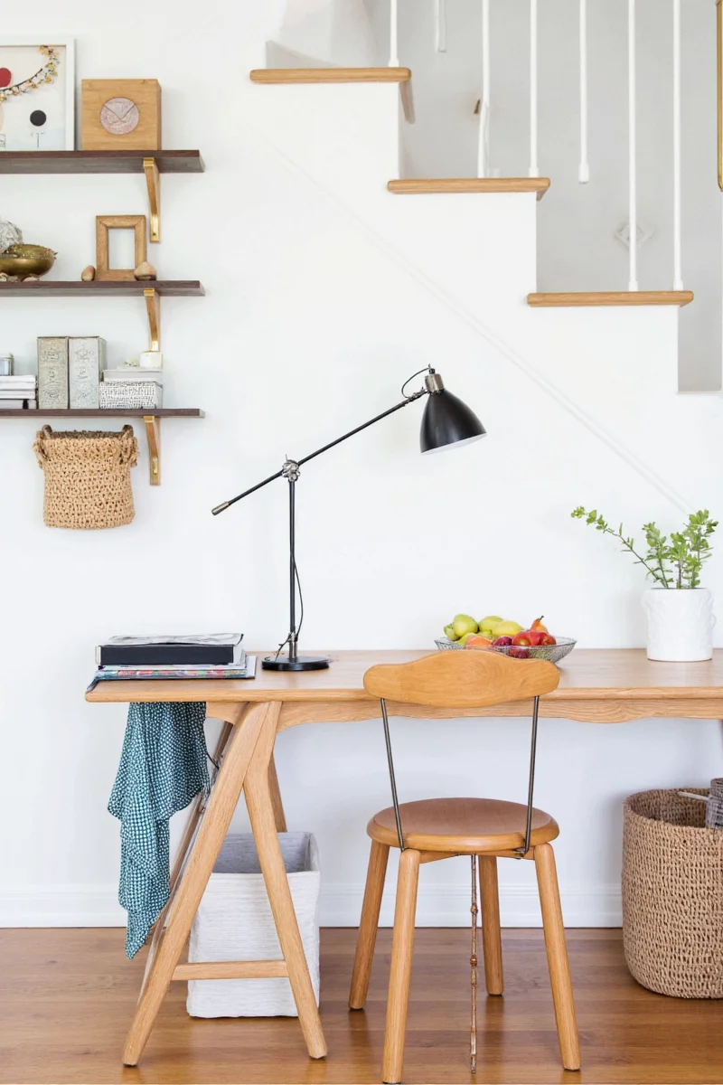A cozy family room featuring modular seating, playful decor, and storage baskets