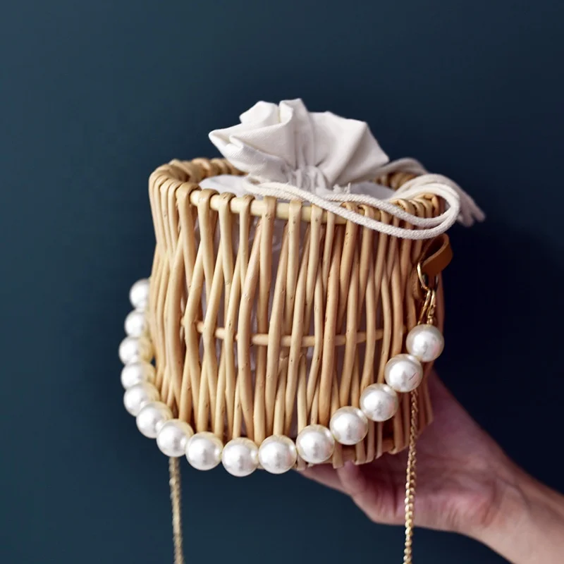 

Female pearl bag Handmade woven handbag messenger round rattan bag