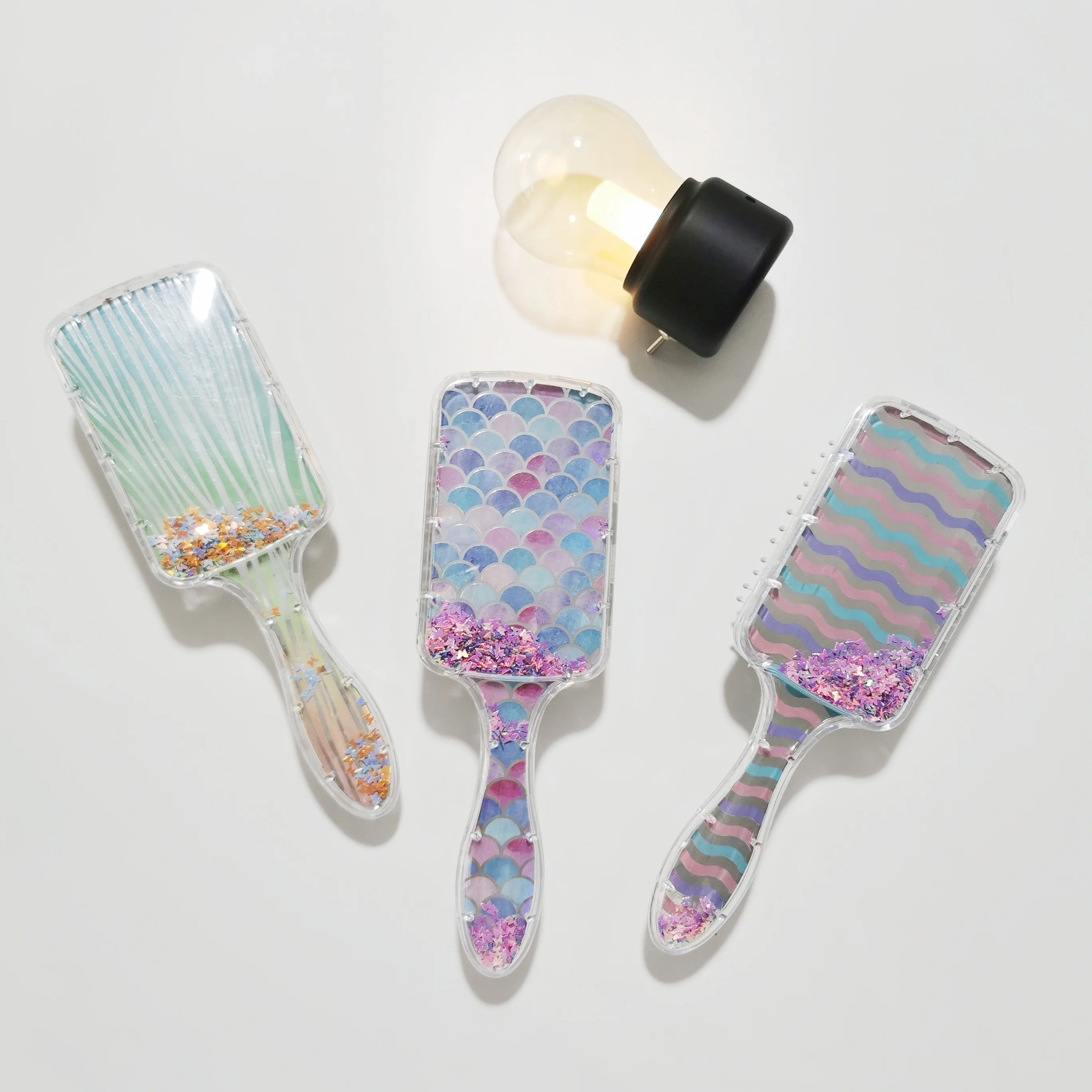 

Low MOQ New Design Laser Rectangle Airbag Hair Brush Confetti Glitter Customized Hairbrush Sequins Transparent Paddle Hair Brush, Customized color