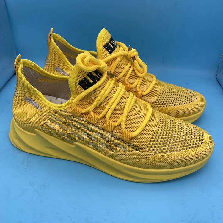 

Wholesale promotion cheap price stock breathable trendy sports sneakers men women lightweight fly knit casual shoes, Black red, yellow