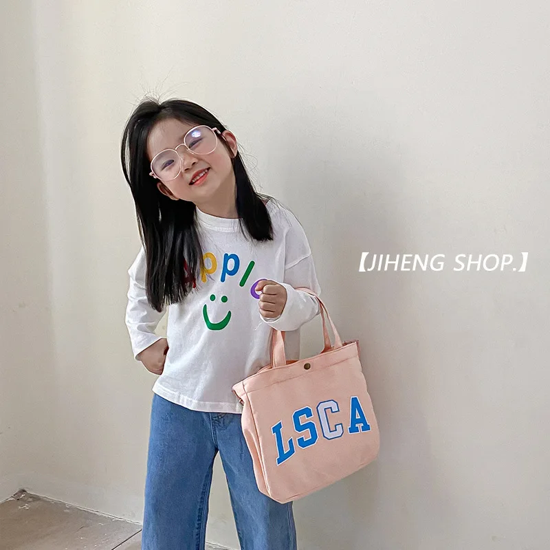

2022 spring summer new of foreign style English letters children's boys and girls canvas portable slung bag women