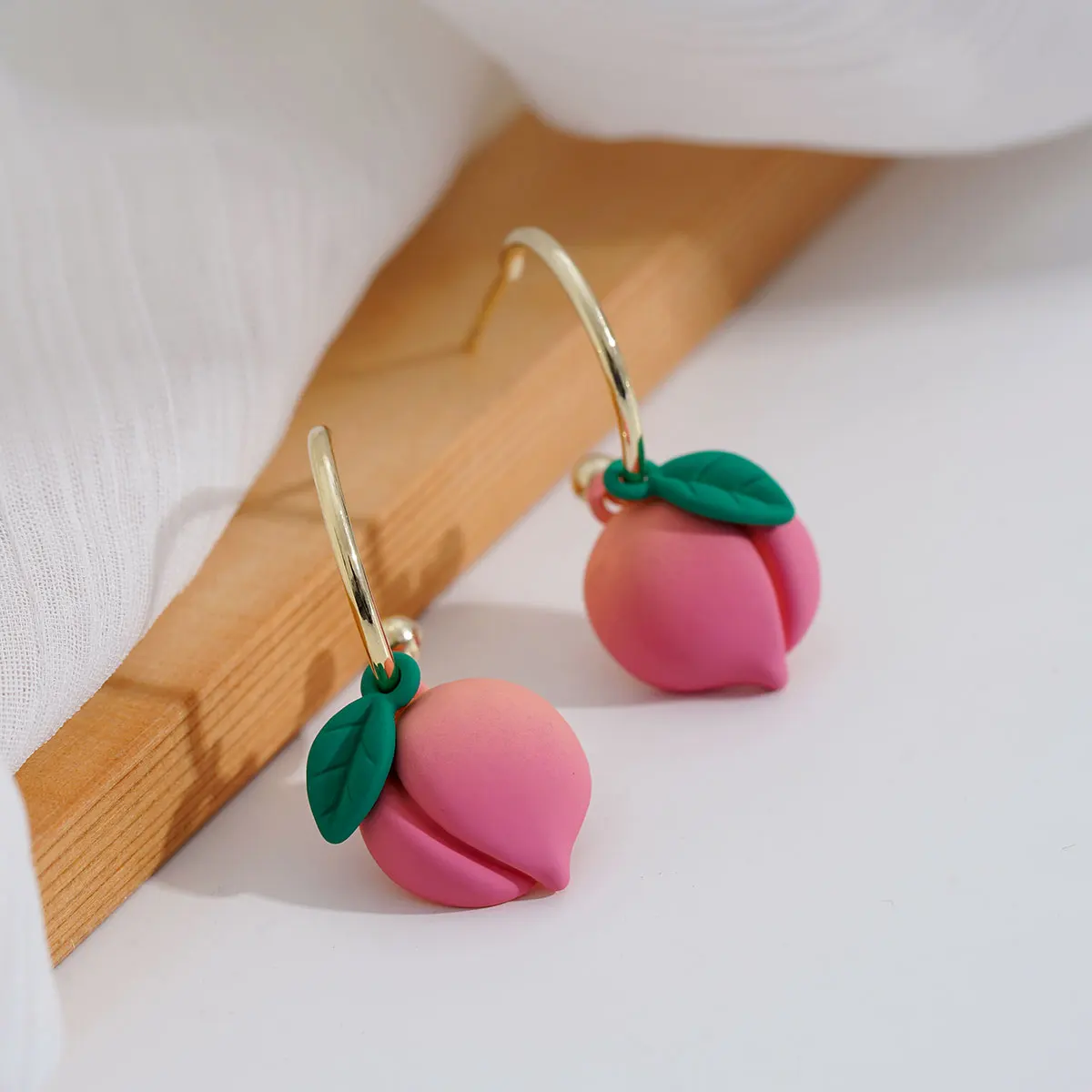 

Korean women's 2021 simple temperament personality summer fruit peach earrings