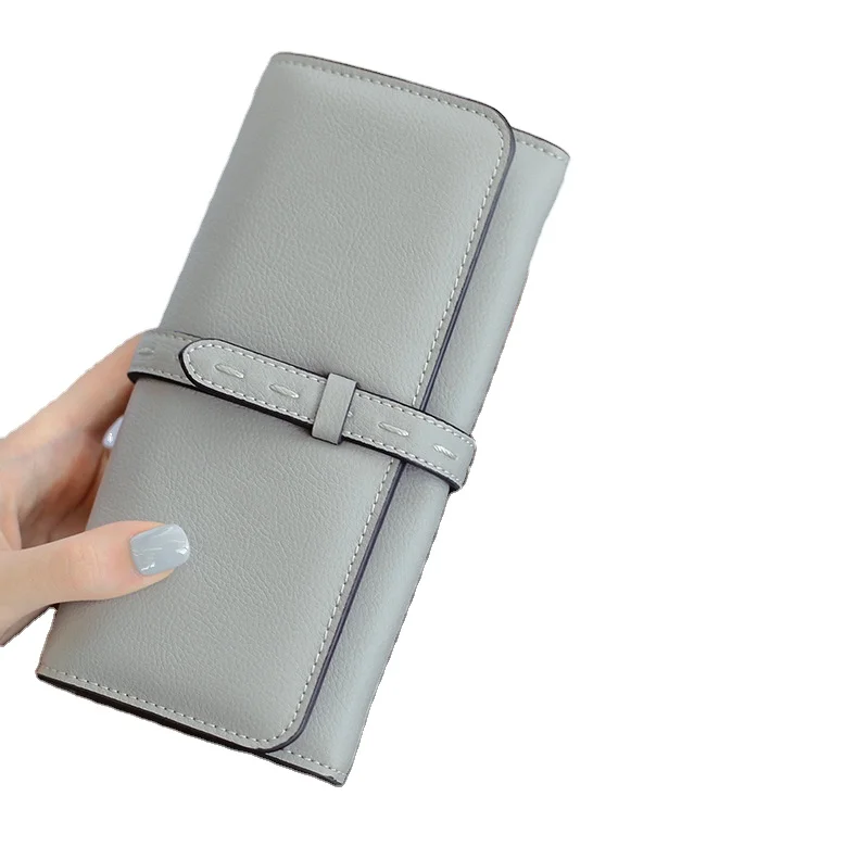 

Minimalistic and Refreshing and solid color style PU material young lady clutch making bag long wallet card holder.,.