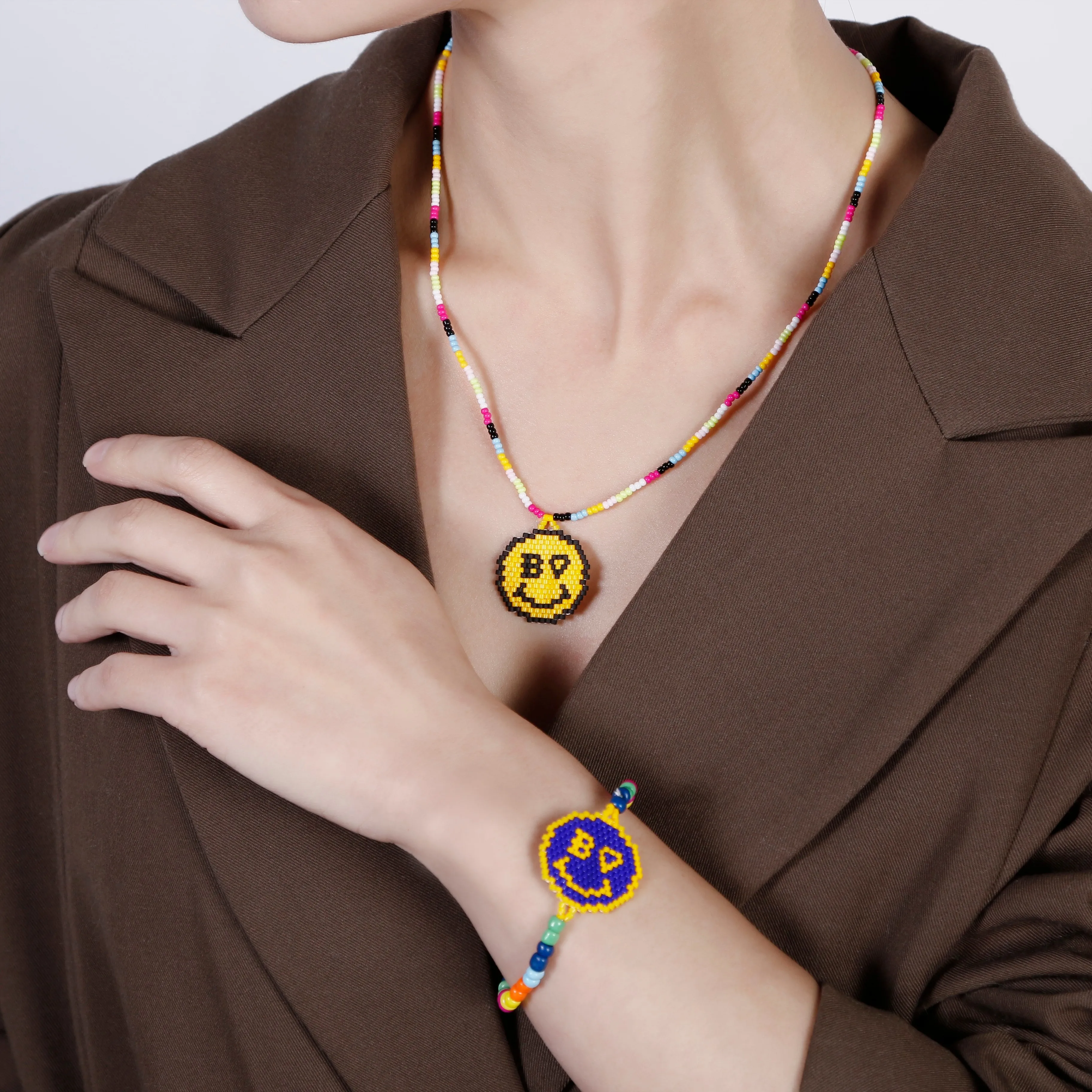 

Custom Handmade Bohemian Colorful Smile Seed Beaded Necklace Bracelet Tassel Miyuki Earrings Jewelry Set For Women, Pictures show