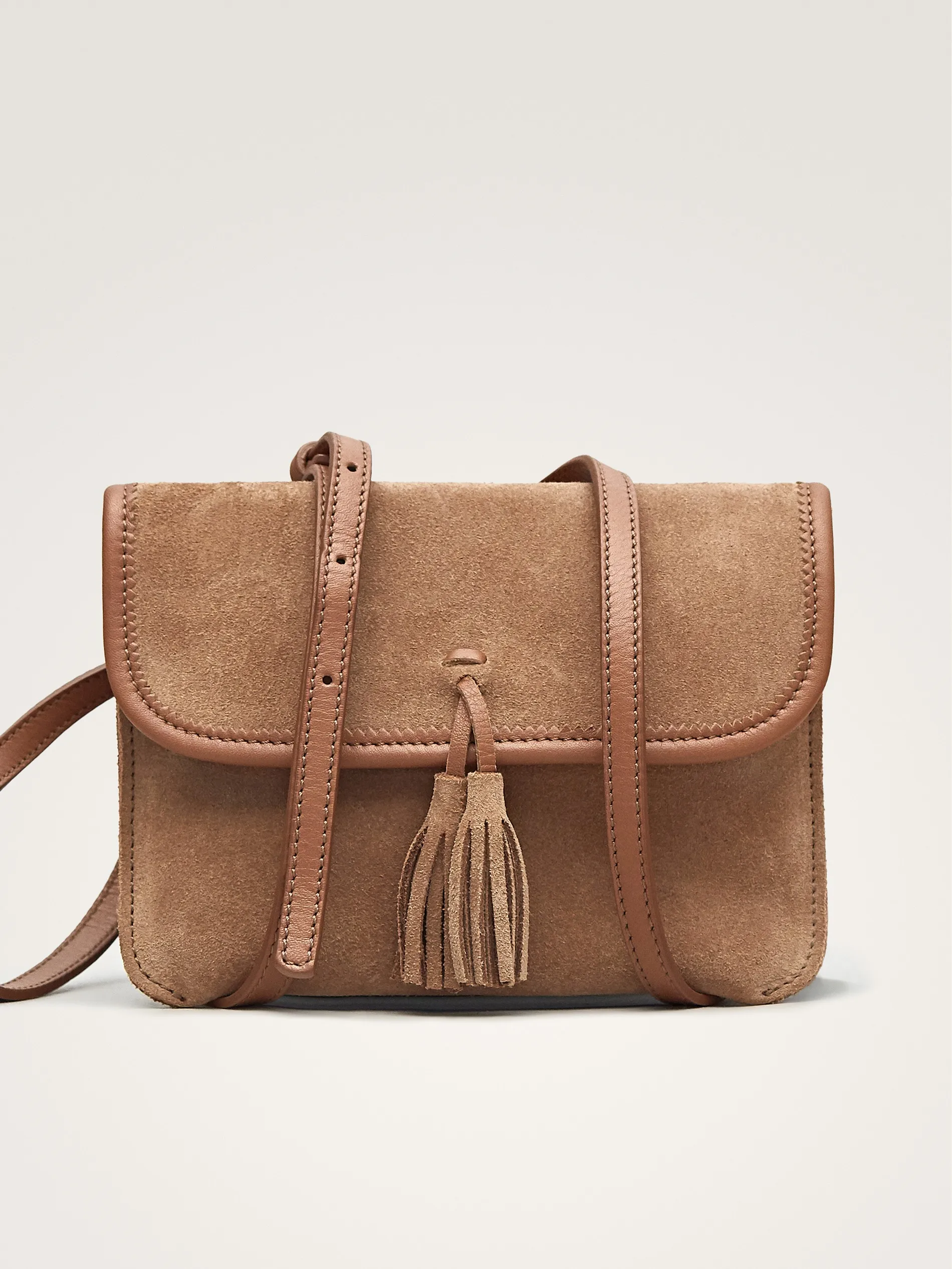 手提包和斜挎包  手提包  流苏皮革绒面革斜挎包儿童包 风格 斜挎包包