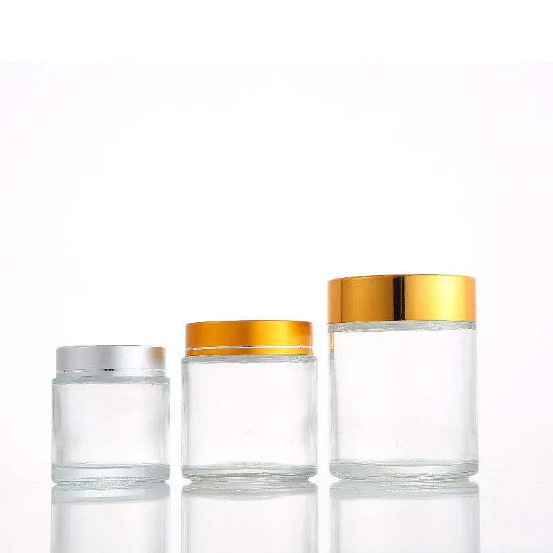 

Wholesale cosmetic jars stock available empty clear round 100g 120g 200g custom cosmetic skincare cream glass jar