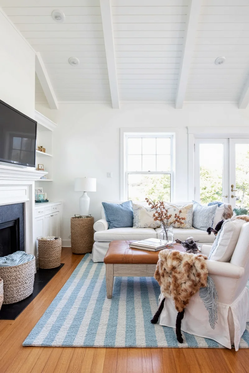 Cape Cod living room with white walls and blue accents