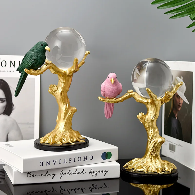 

Resin CRYSTAL BALL WITH BIRD ON gold tree branch statue modern luxury decoration for home office hotel table TV stand hallway