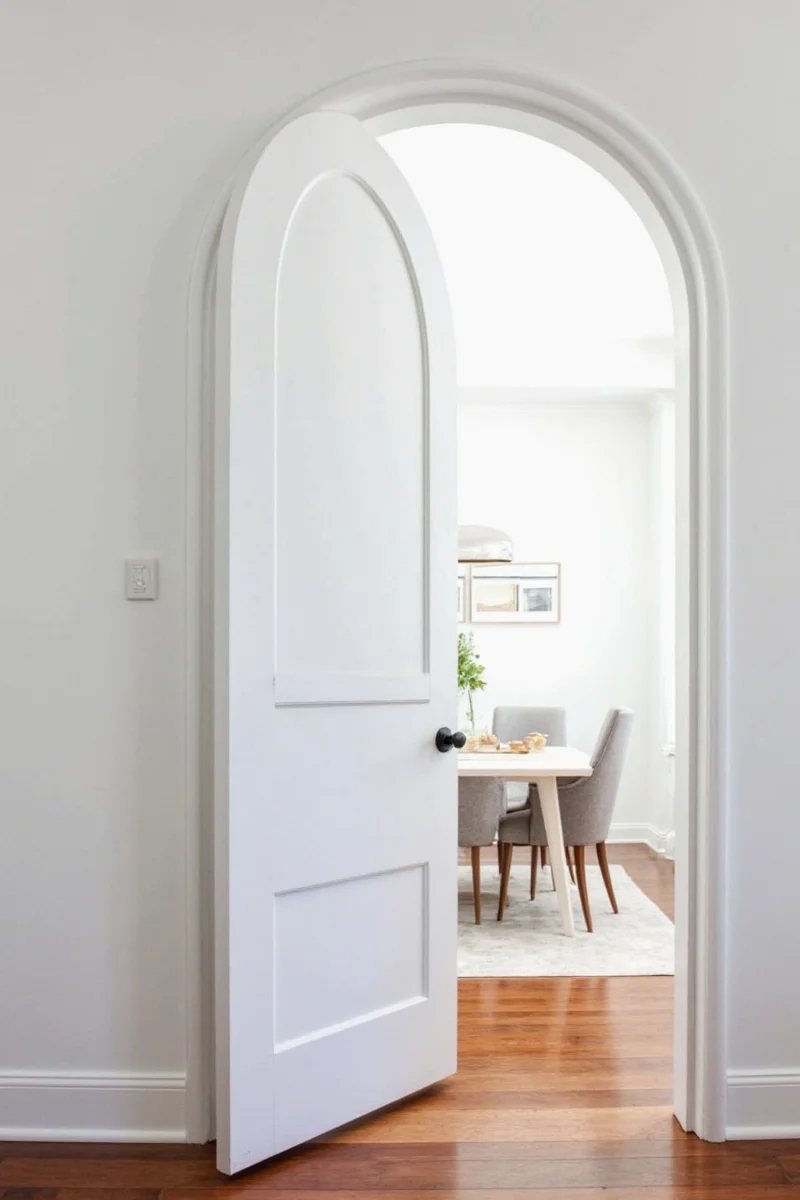 Chalkboard painted arched molding with kids drawings